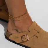Golden anklet with stars